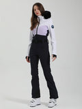 Gsou Snow Chic Damen-Skianzug mit ikonischem Kunstpelzbesatz, einteilig